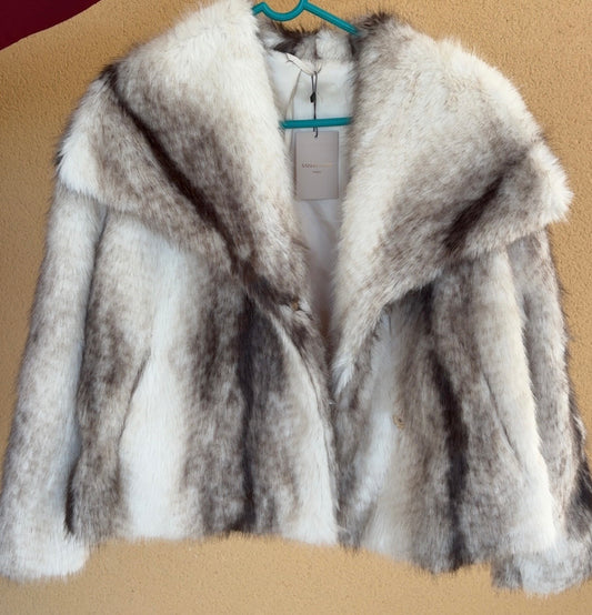 Veste a fourrure beige avec poches